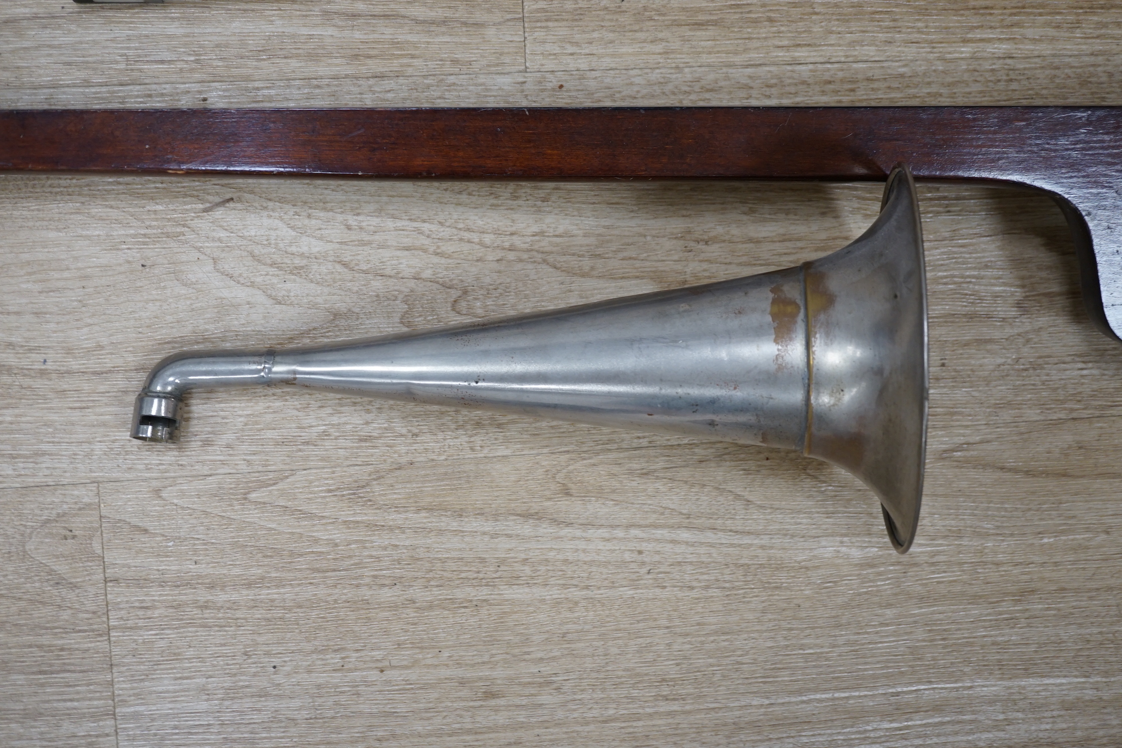 A 1920s Phono-fiddle by Jedson, with chrome horn and bow with simulated ivory tip, overall length 89cm